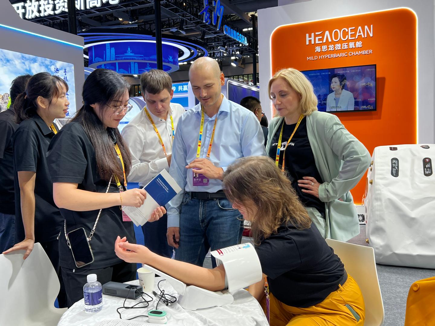 Visitors talking with HEAOCEAN staff at the CIFIT 2026 booth