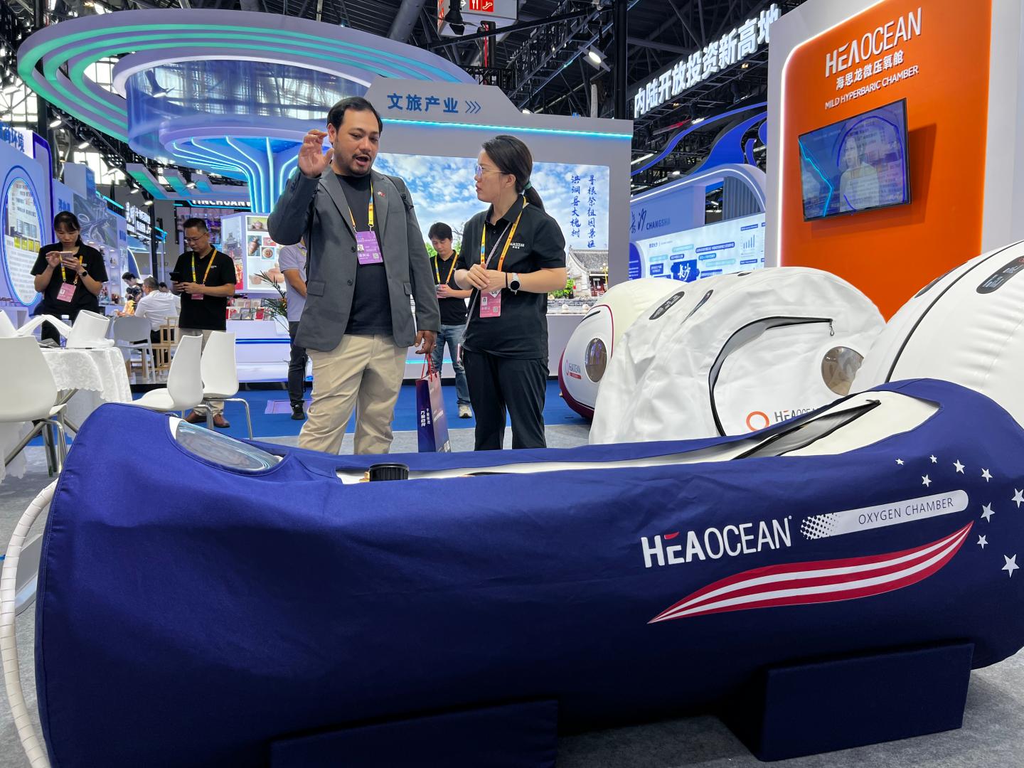 A row of navy HEAOCEAN lying chambers on the stand